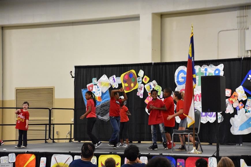  Students dancing on the stage at the Very Special Arts Event